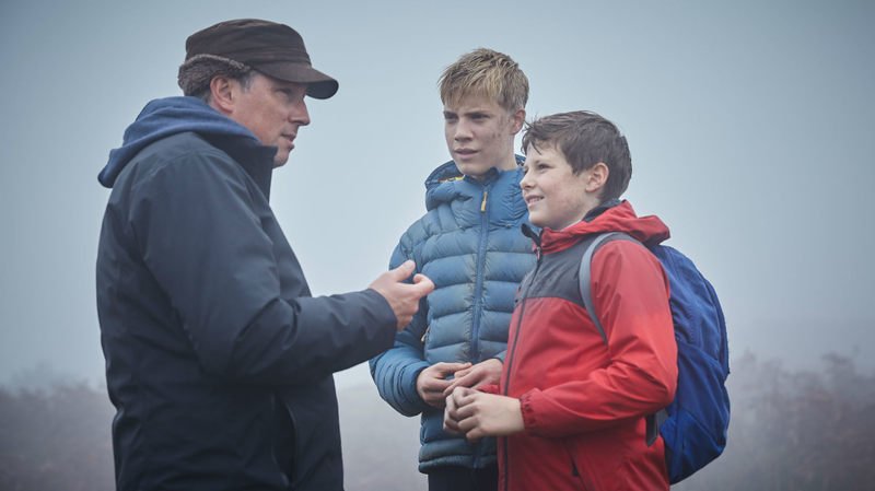 Joe Cornish on the set of The Kid Who Would Be King, along with Louis Serkis and Tom Taylor.